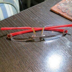 Tag Heuer Reflex rimless glasses red